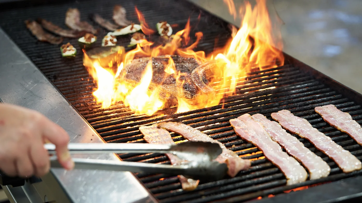 bacon related food on grill