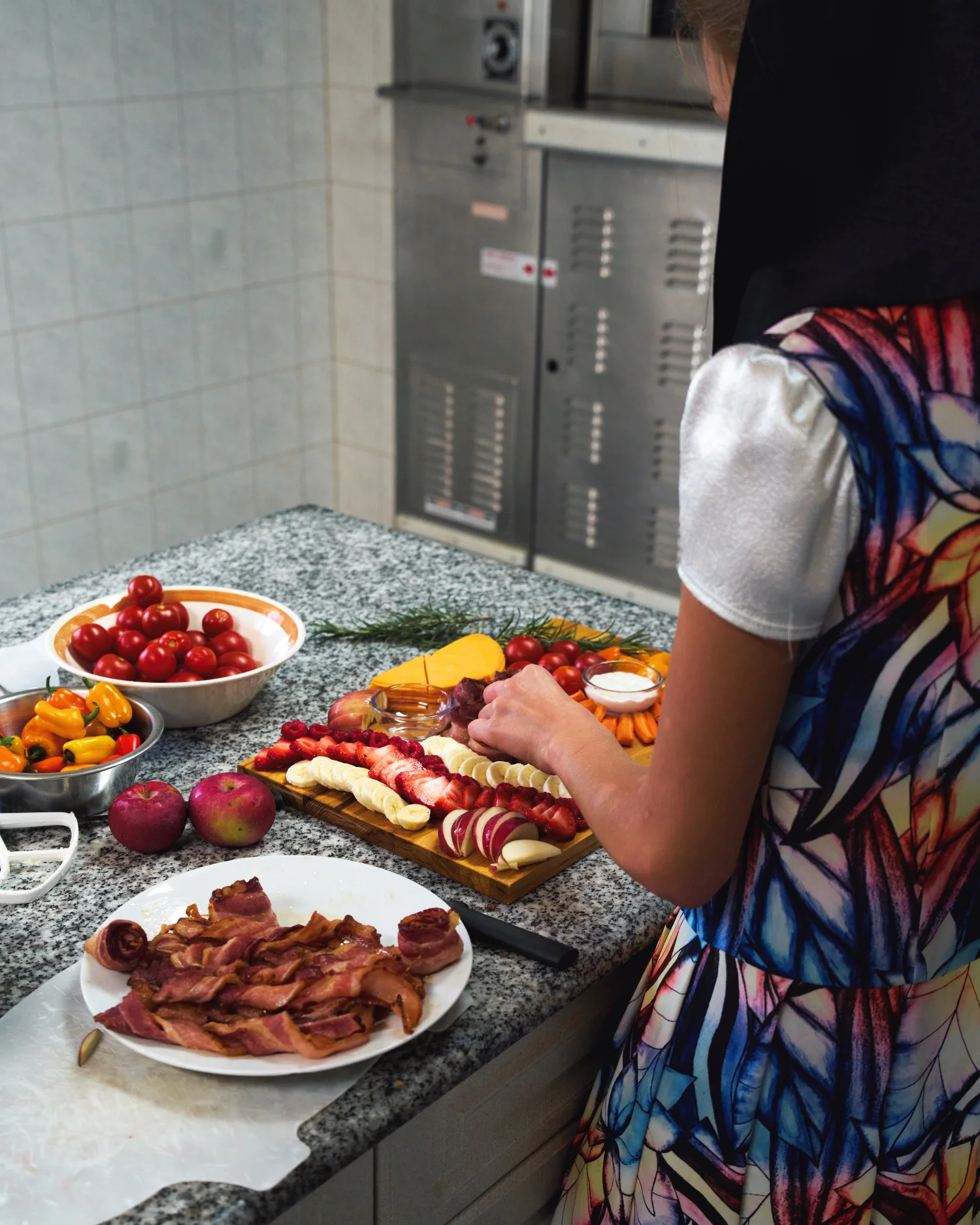 woman preparing food with bacon