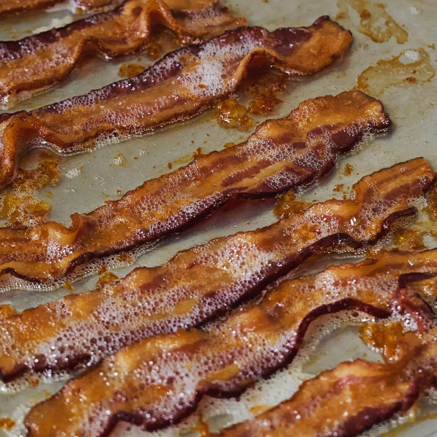 Bacon sizzling on a pan